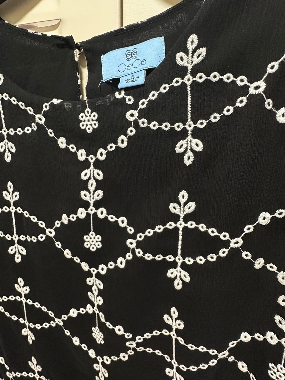 CeCe Black Blouse with White Embroidered Pattern and Ruffle Sleeves - Picture 4 of 5